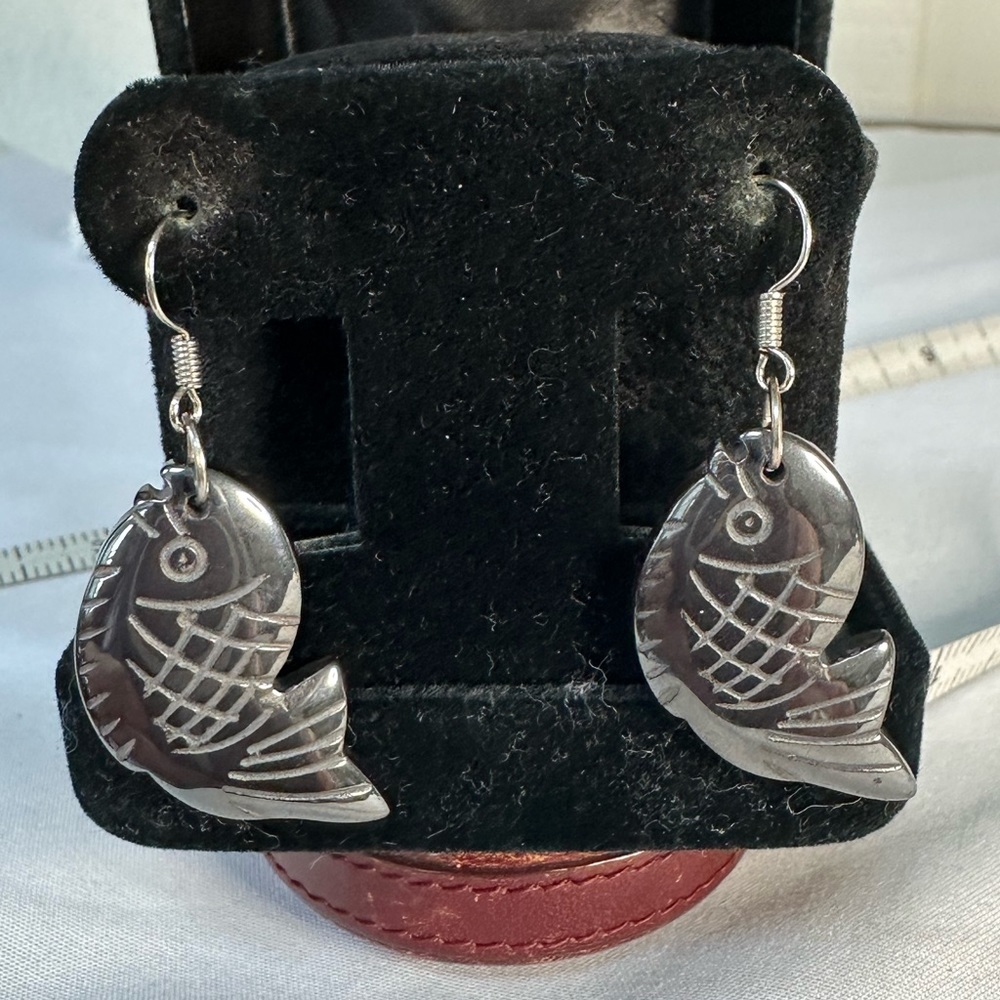 Carved gunmetal gray fish earrings